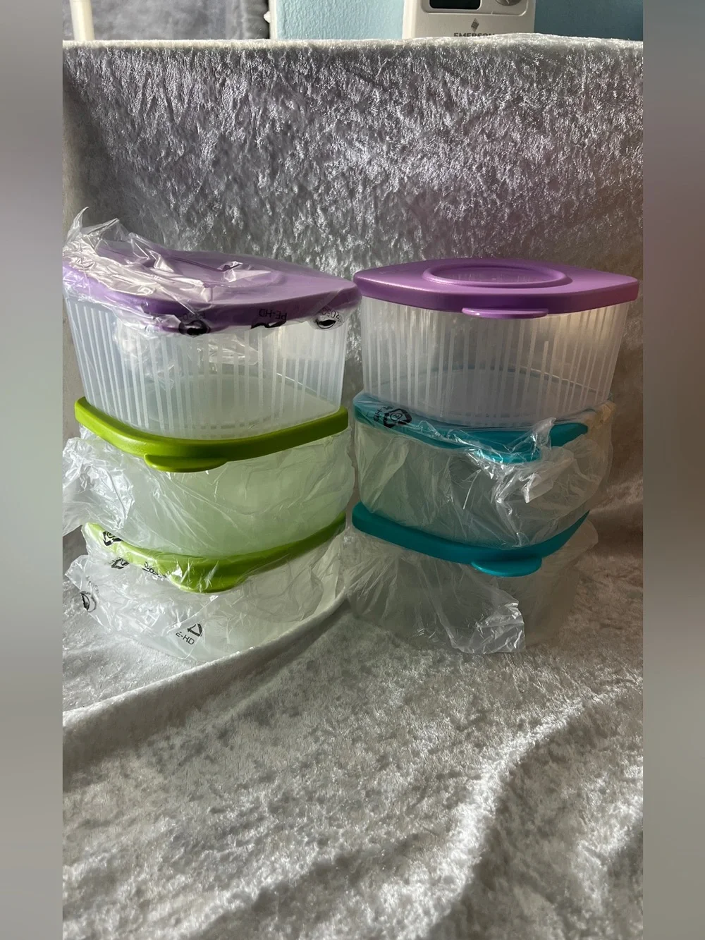 Tupperware Clear Containers with Purple, Green, and Teal Lids
